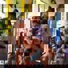 Irene vrijwilliger Thailand kind op rug 