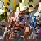 Vrijwilligerswerk Thailand community project vrijwilliger met kind 